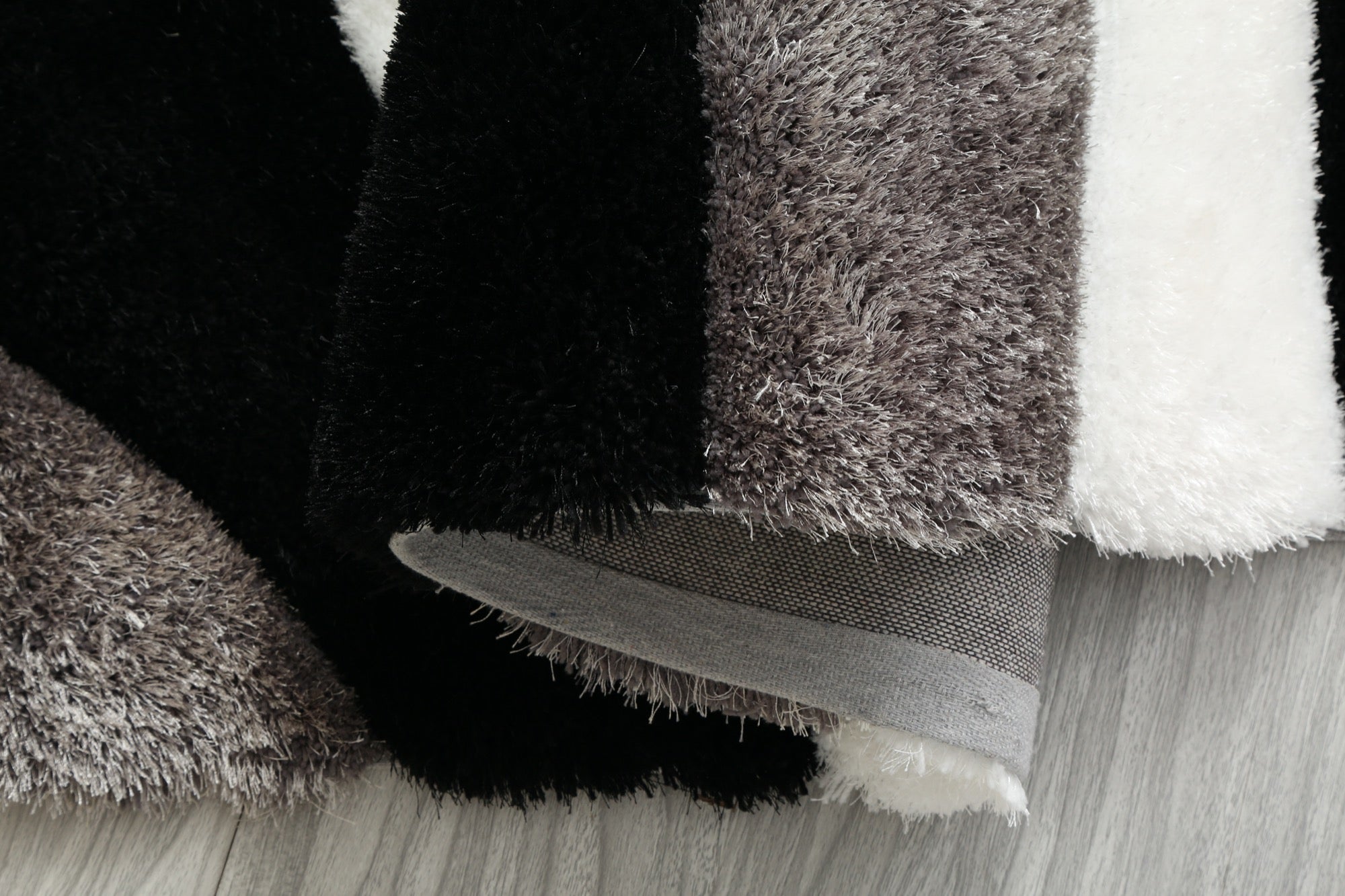Mateos Shag 8x10 Area Rug - Adams Furniture