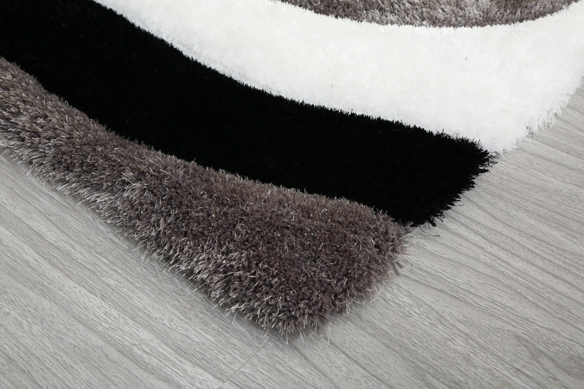 Mateos Shag 8x10 Area Rug - Adams Furniture