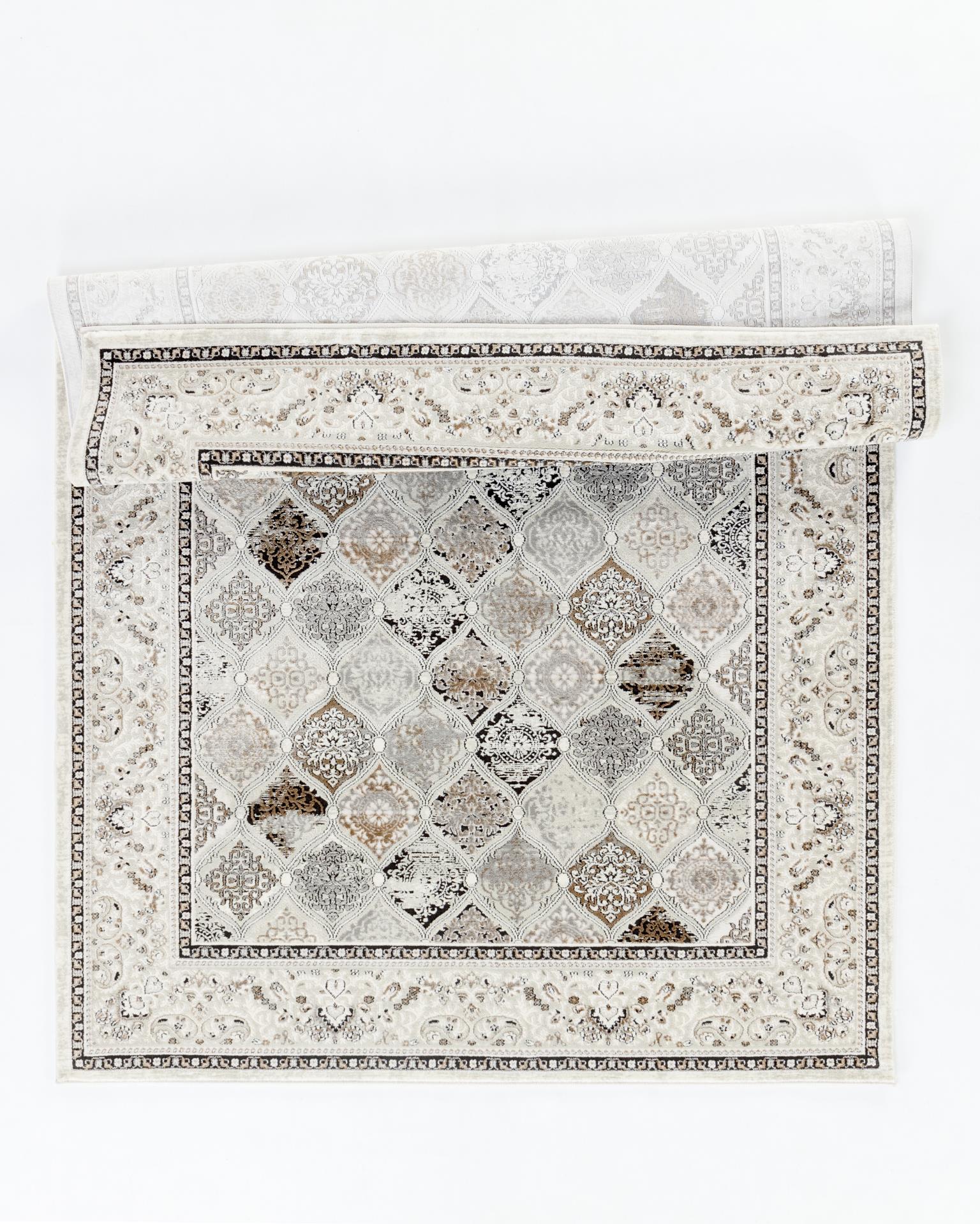 Omari 8X11 Area Rug - Adams Furniture