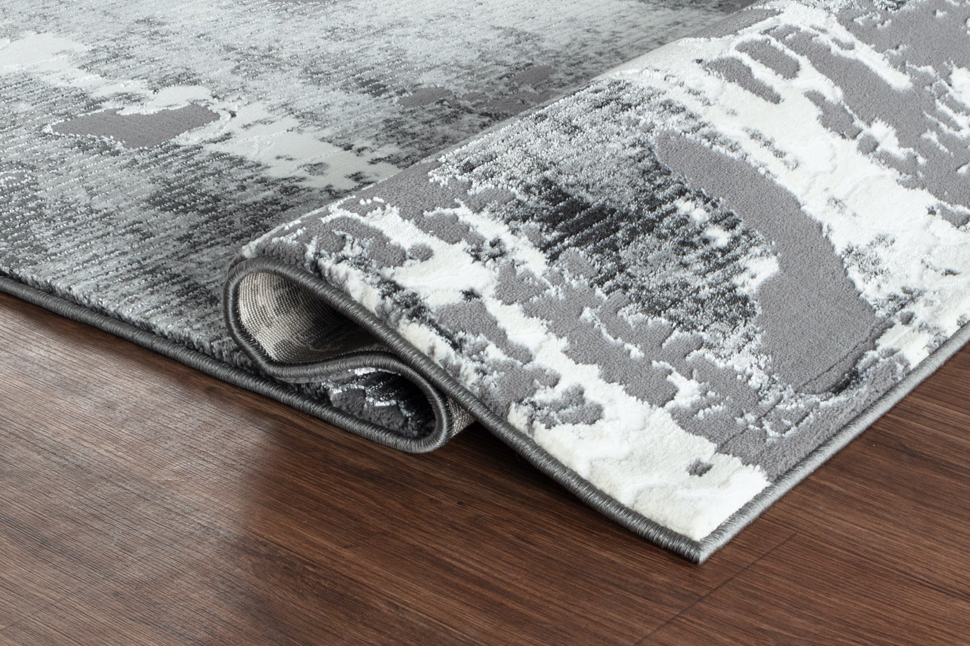 Petra 5x8 Area Rug - Adams Furniture
