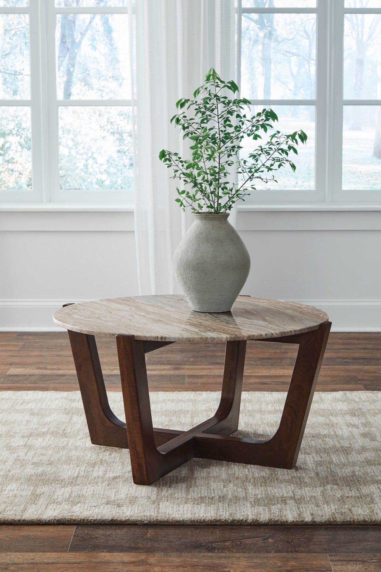 Warm Brown Round Coffee Table - Adams Furniture