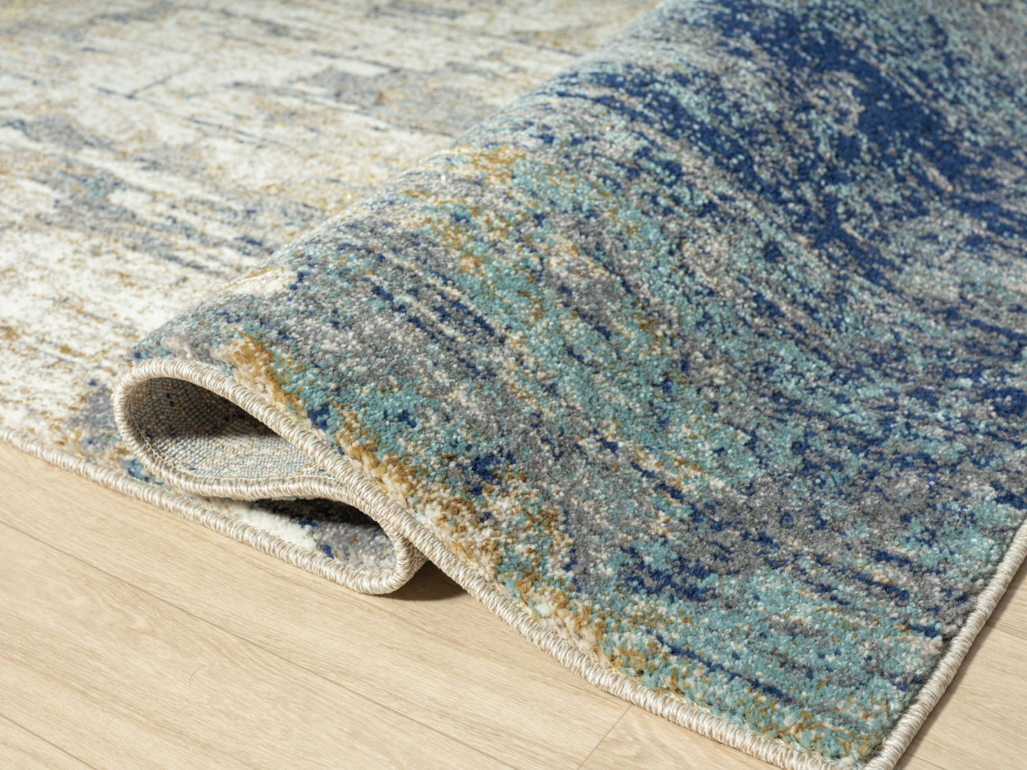 Milan 5x7 Brown Area Rug - Adams Furniture